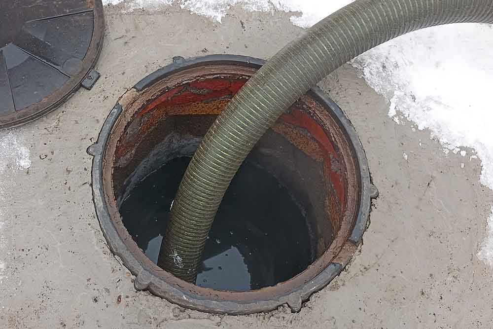 septic tank being pumped